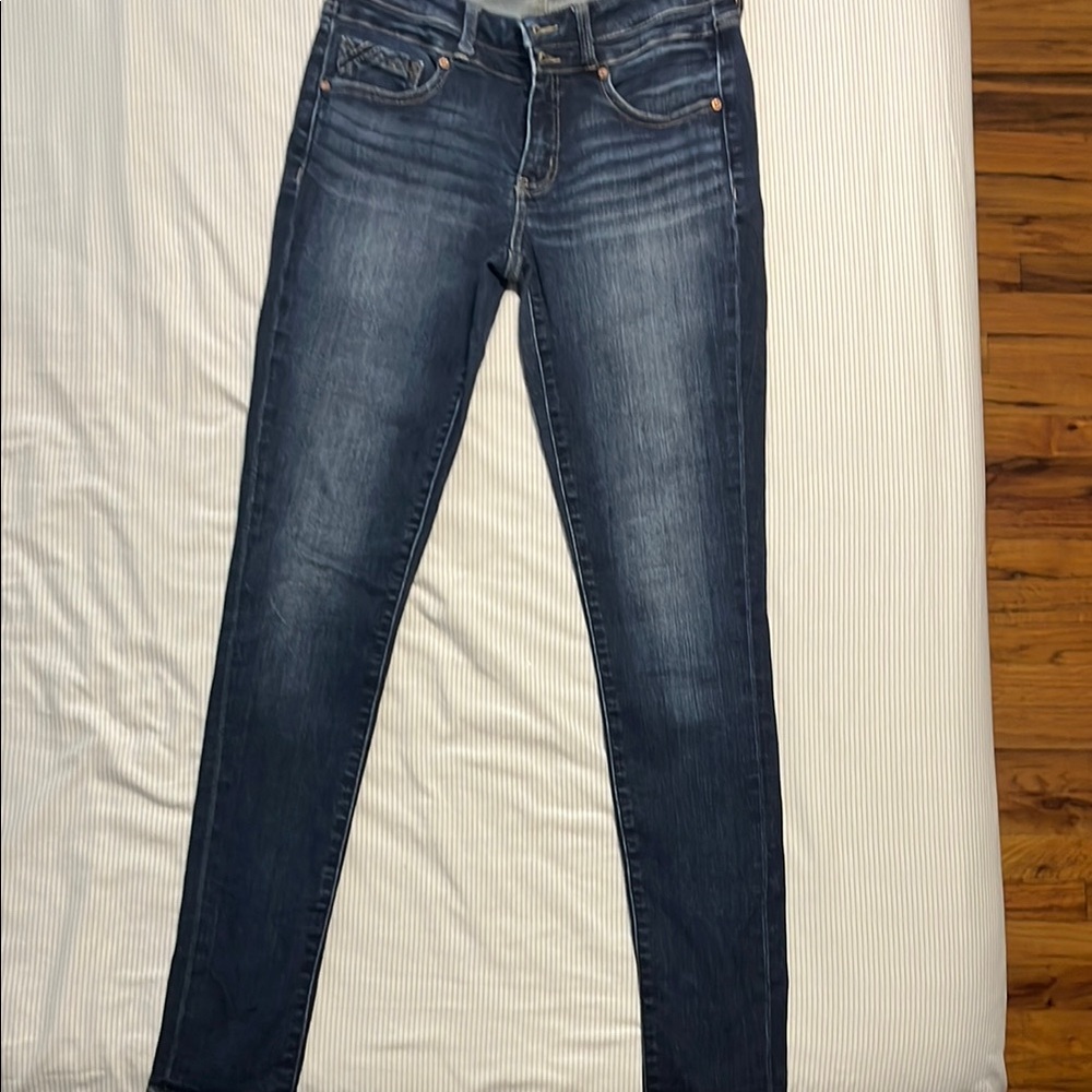 Buckle Jeans in Blue with Distressed Finish